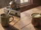 Side-by-side comparison of mate cocido and mate con leche served in mugs with a bombilla